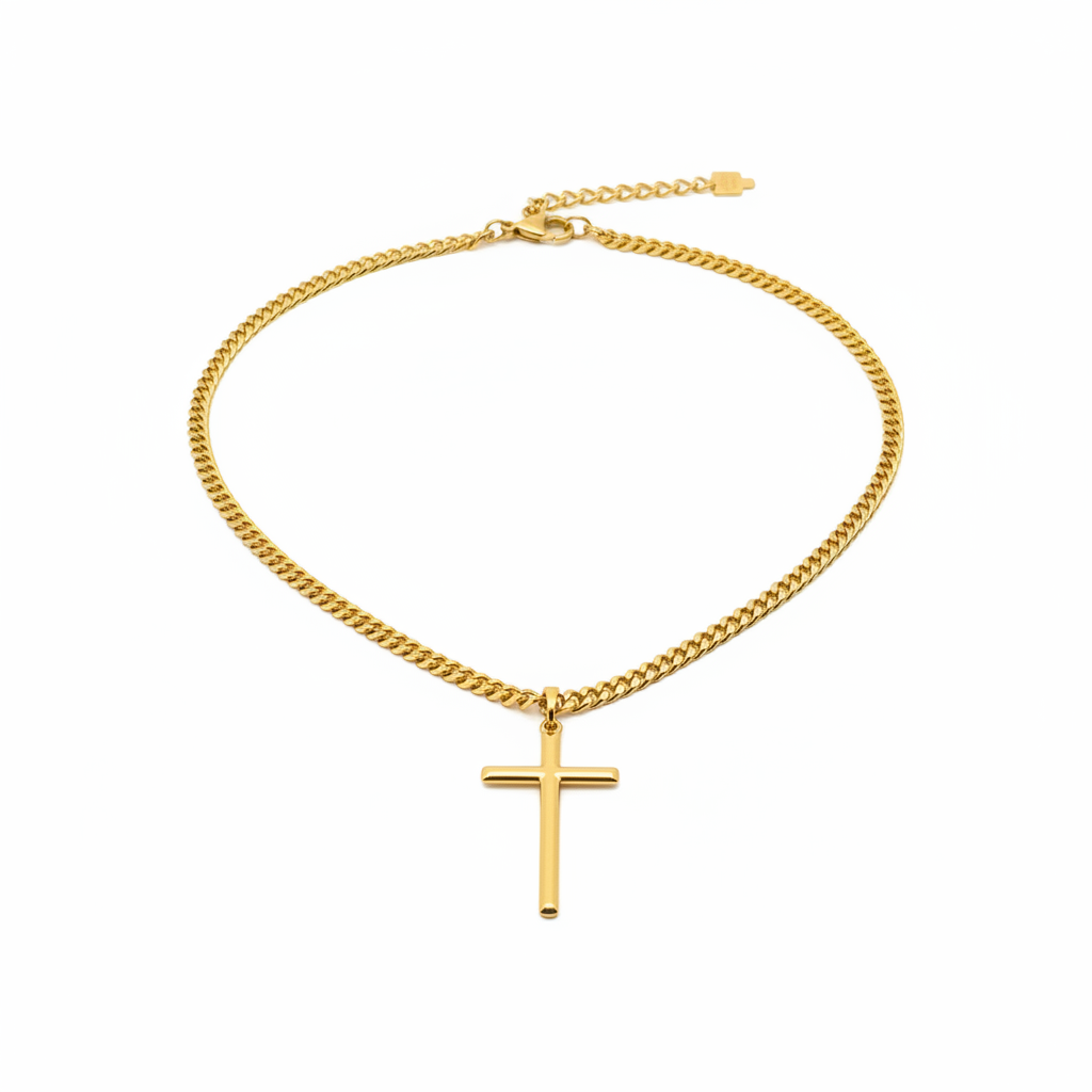 Gold chain bracelet with a cross pendant on a white background