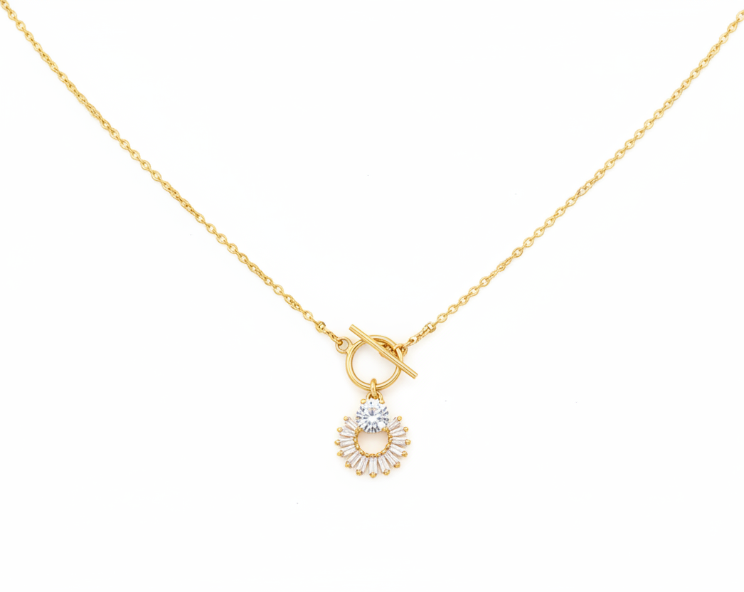 Gold necklace with a sunflower pendant on a white background