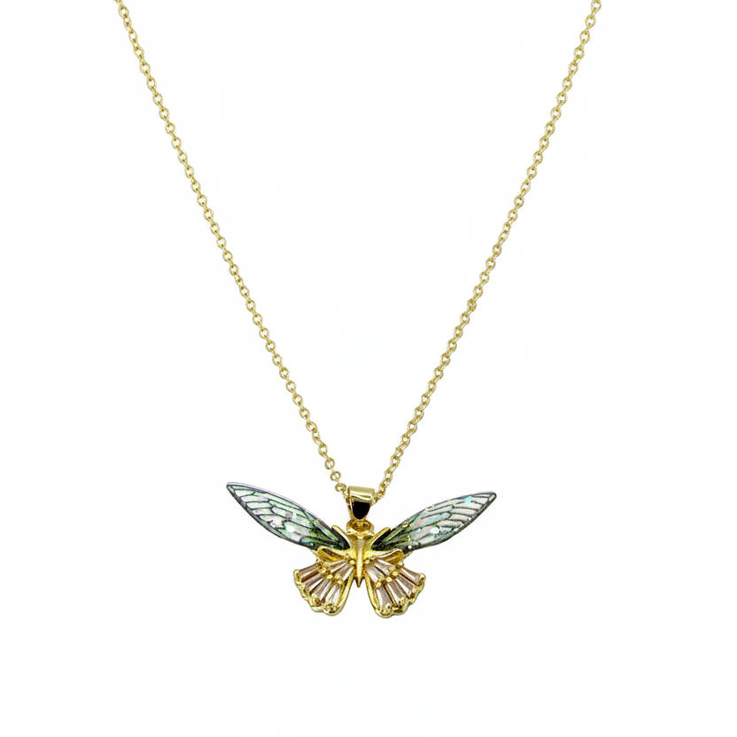 Gold butterfly pendant necklace on a white background