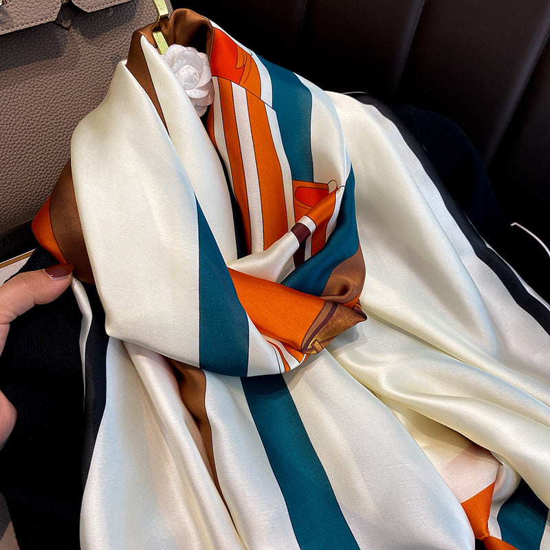 Colorful striped scarf with a floral arrangement on a car seat
