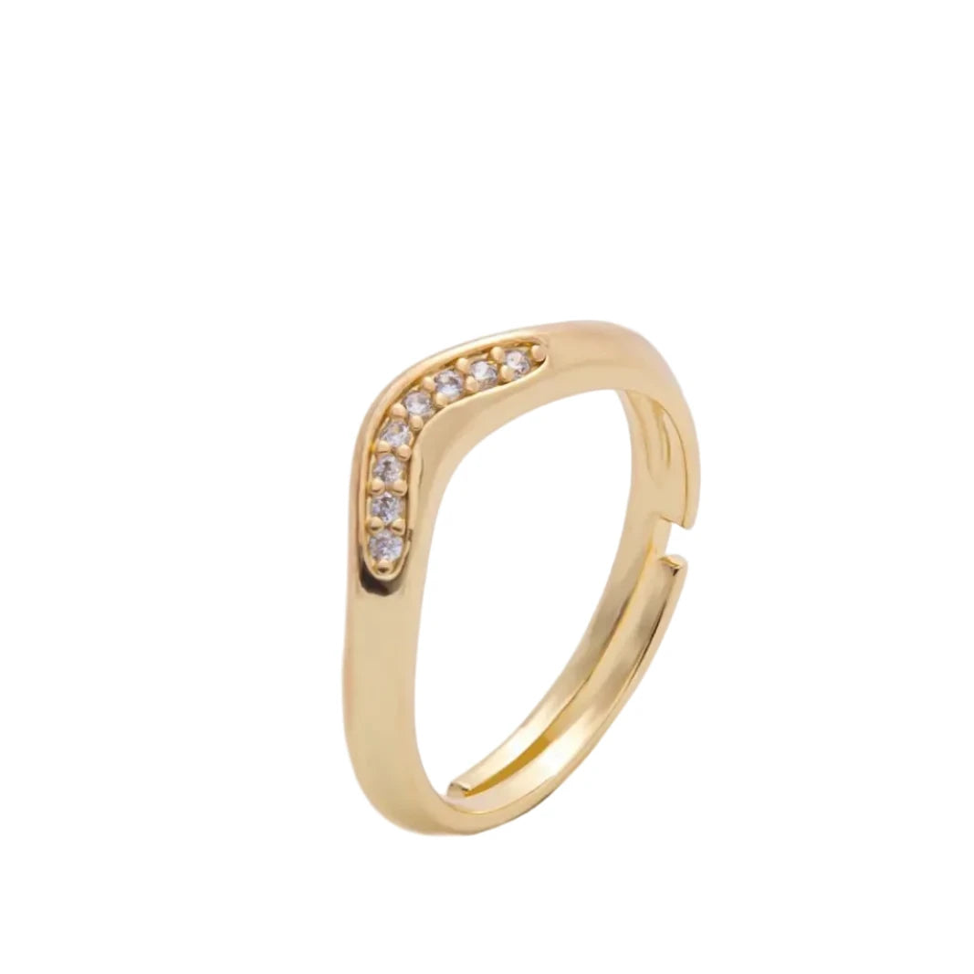 Gold ring with small diamonds on a white background