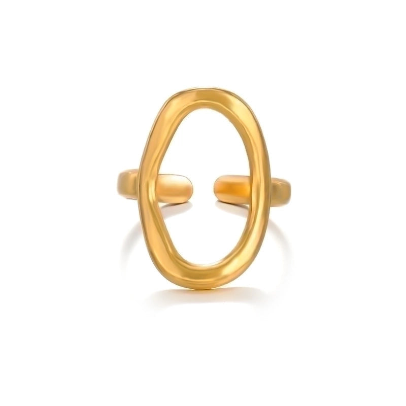 Gold ring with a unique design on a white background