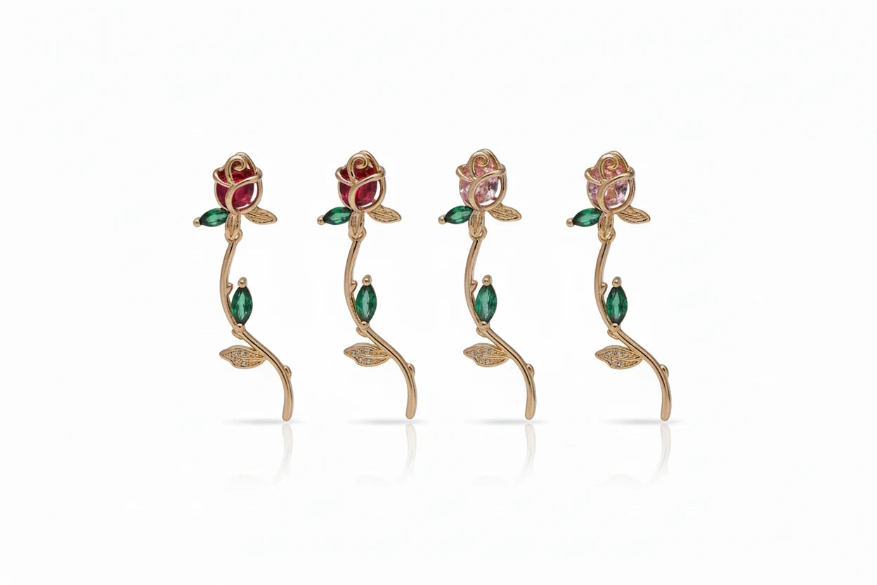 Floral earrings with gemstones on a white background