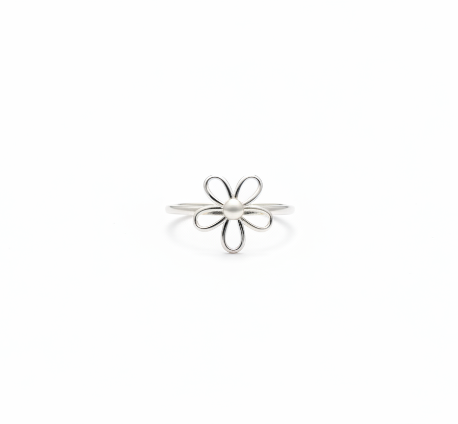 Silver flower-shaped ring on a white background