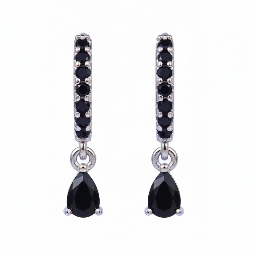 Pair of black teardrop earrings with silver accents on a white background