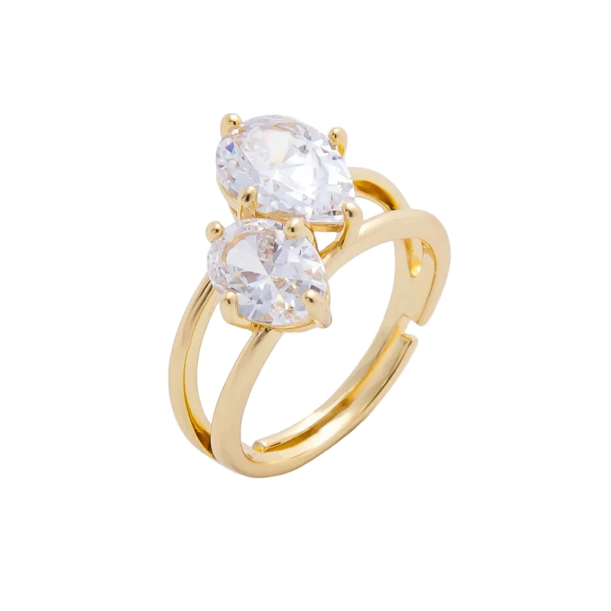 Gold ring with two clear gemstones on a white background