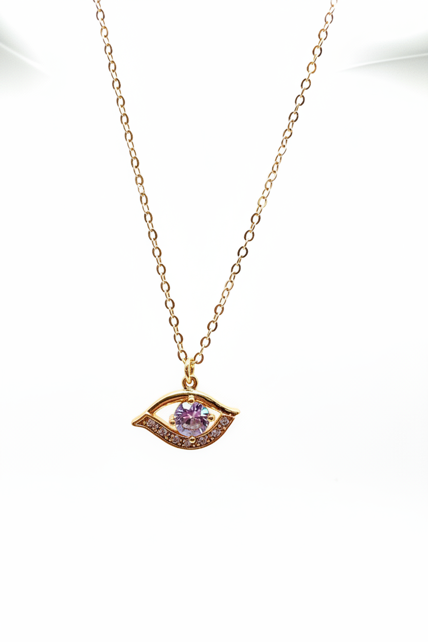 Gold necklace with an eye-shaped pendant on a white background
