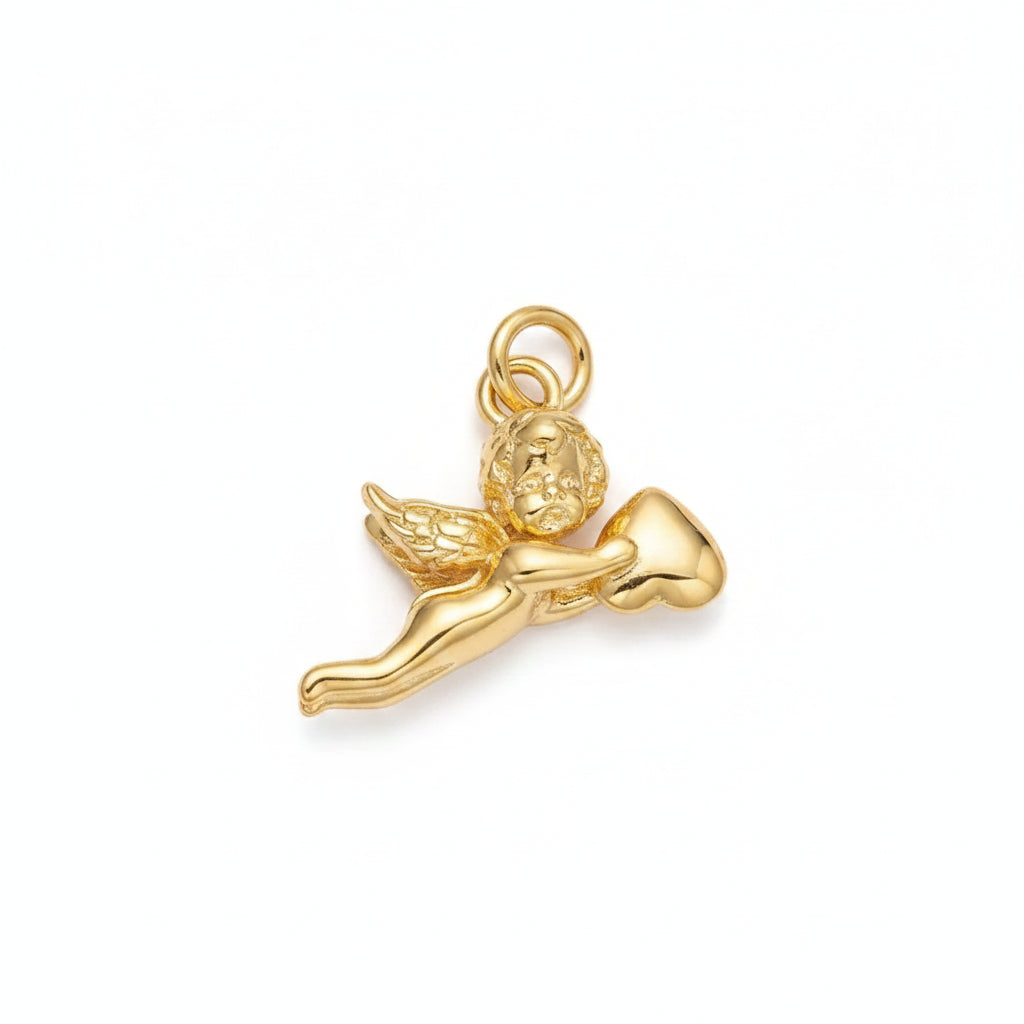 Gold angel charm on a light purple background