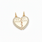 Gold heart-shaped 'Best Friends' pendants on a light gray background