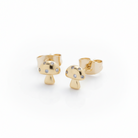 Gold mushroom-shaped earrings with small stones on a light gray background