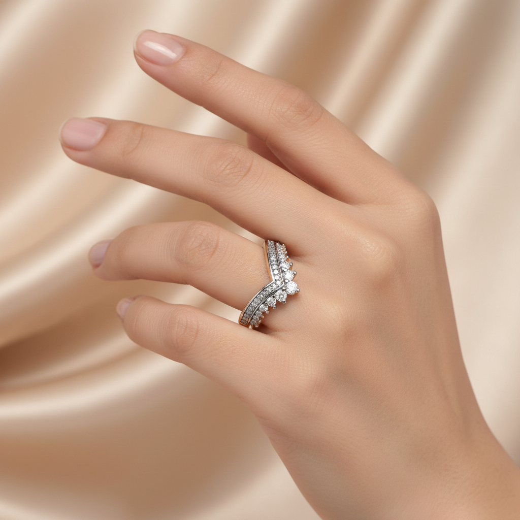Hand wearing a diamond ring on a beige fabric background