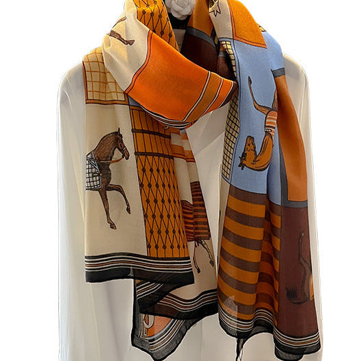 Colorful scarf with animal patterns on a white stand