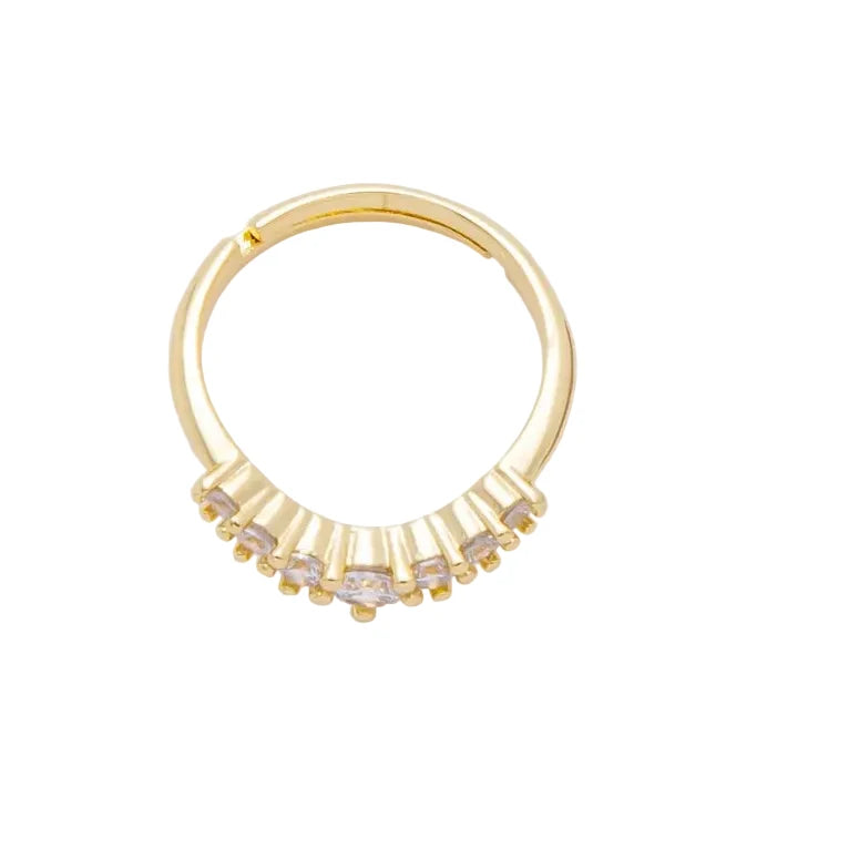 Gold ring with small diamonds on a white background