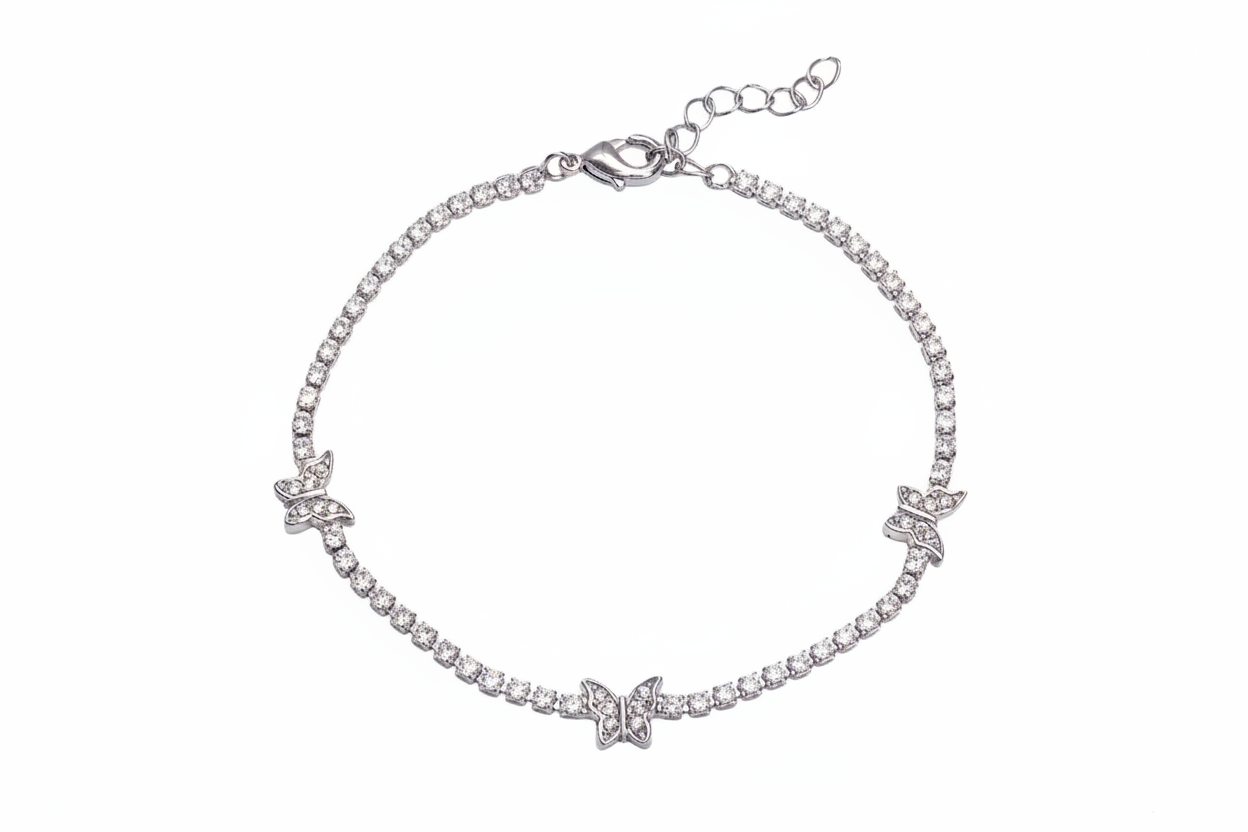 Silver bracelet with butterfly charms on a white background