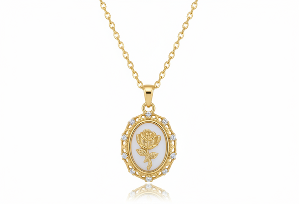 Gold necklace with a rose pendant on a white background
