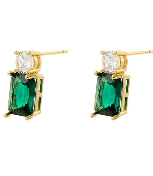 Gold earrings with green gemstones on a white background