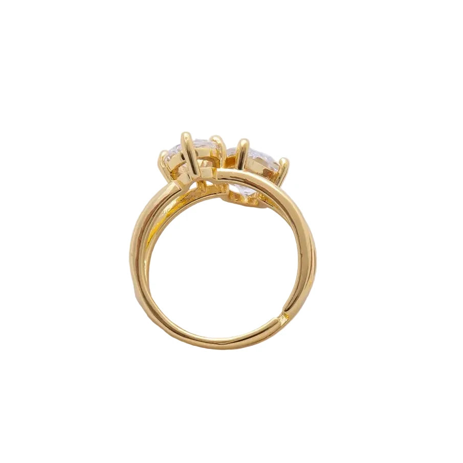 Gold ring with a diamond on a white background