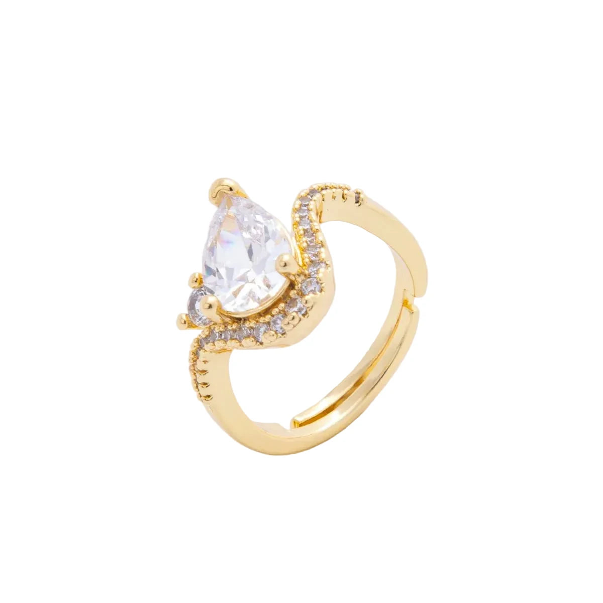 Gold ring with a clear gemstone on a white background