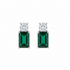 Pair of emerald-cut gemstone earrings with clear stones on a white background
