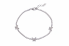 Silver bracelet with butterfly charms on a white background