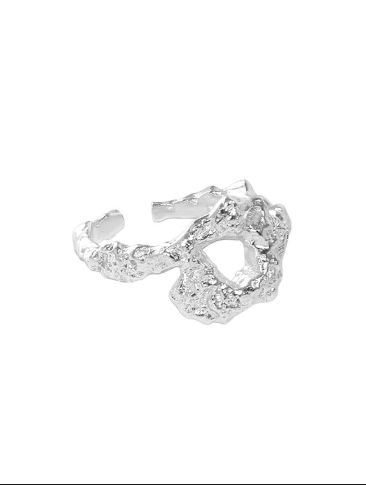 Silver ring with a textured design on a white background