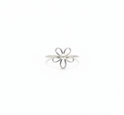 Silver flower-shaped ring on a white background