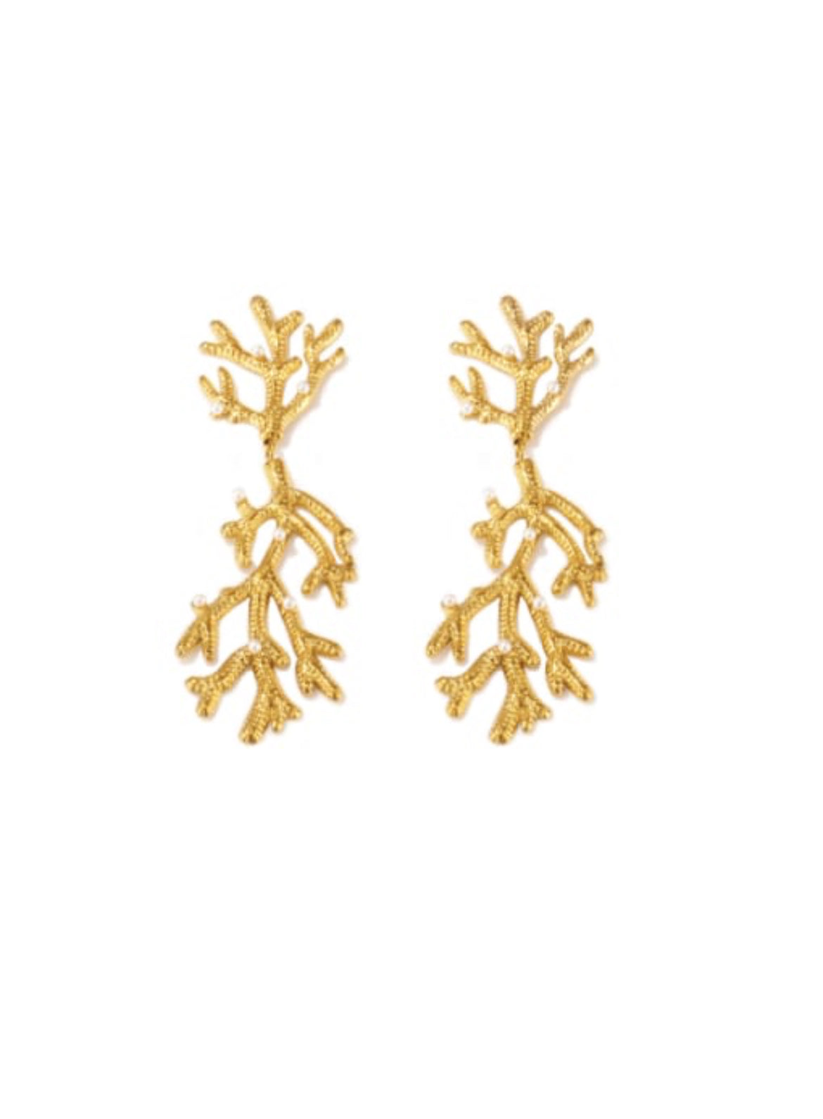 Gold leaf-shaped earrings on a white background