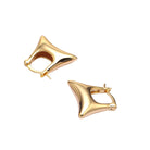 Gold hoop earrings on a white background