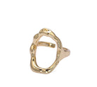Gold ring with a unique design on a white background