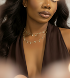 A screenshot of a mobile photo-editing app showing a portrait of a woman with warm bokeh light effects, plus interface buttons such as Cancel, Save, Generate, Crop, Background, and Informative.