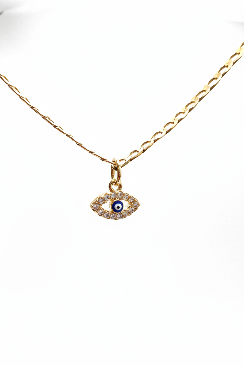 Gold necklace with an eye-shaped pendant on a white background