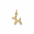 Gold balloon dog charm on a light gray background
