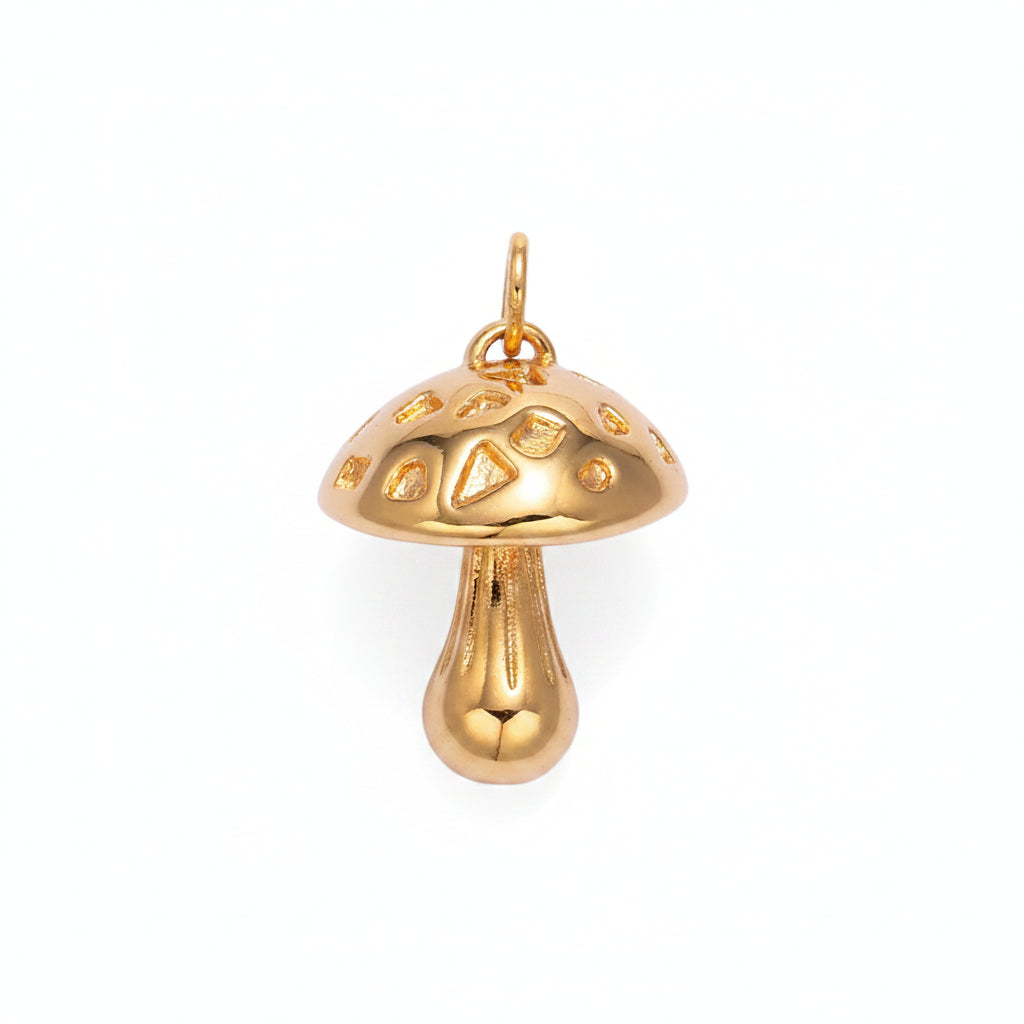 Gold mushroom-shaped pendant on a light purple background