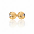 Pair of gold earrings on a white background