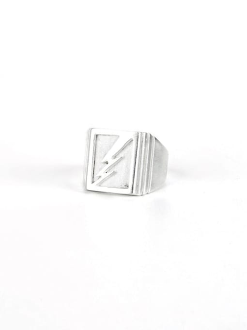 Silver ring with geometric design on a white background