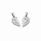 A pair of silver-toned half-heart pendant charms that fit together, engraved with the words 'Best Friends' and small heart motifs, shown on a light lavender background.