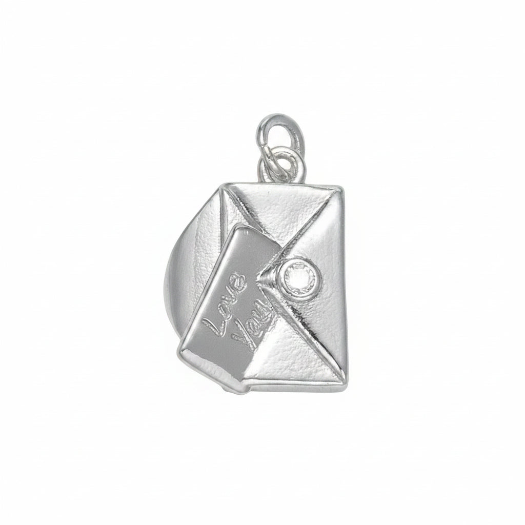 A silver charm shaped like a folded envelope with the words 'Love You' engraved on the front flap and a small clear stone detail, shown on a plain light background.