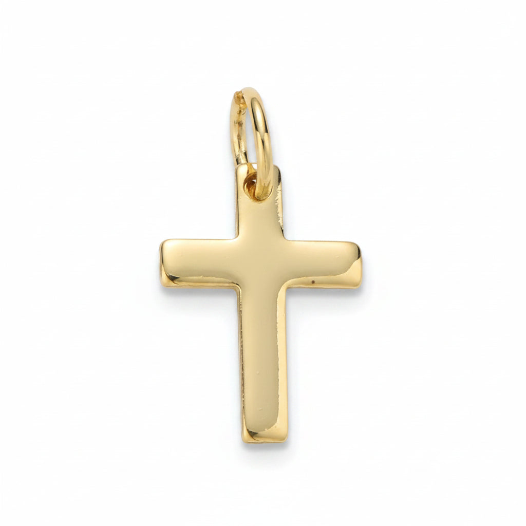 A polished yellow gold cross pendant with a flat, smooth surface and a small integrated top loop, shown on a plain white background.