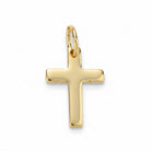 A polished yellow gold cross pendant with a flat, smooth surface and a small integrated top loop, shown on a plain white background.